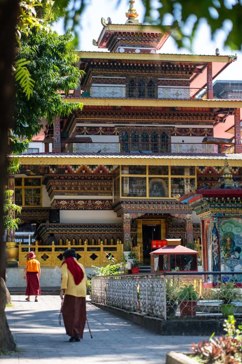 Colorful Bhutanese temple scene with monks